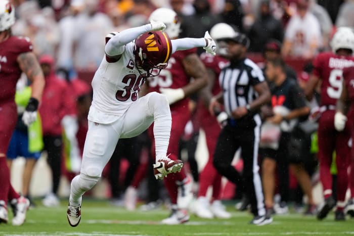 Washington Commanders safety Jeremy Reaves (39) reacts after a play in the second half against the Arizona Cardinals at FedExField.